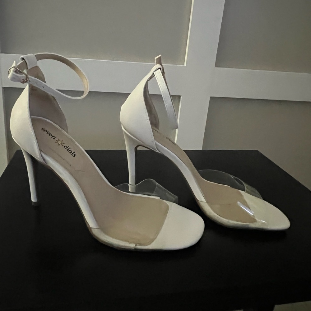 White Heels perfect for casual or formal!  Worn only once.
